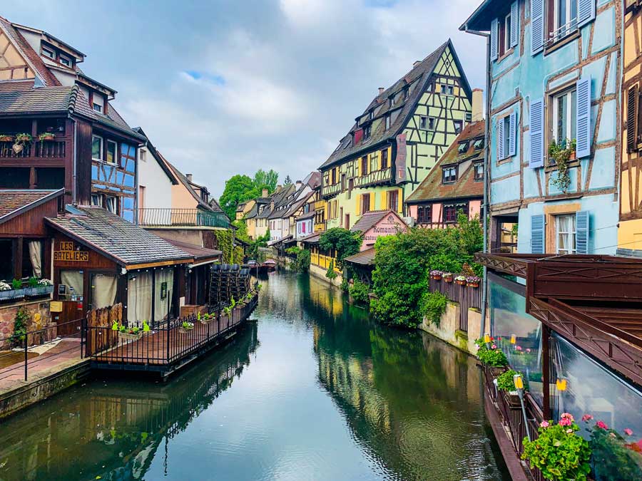 view of Colmar, in eastern France, its canal and its colorful houses